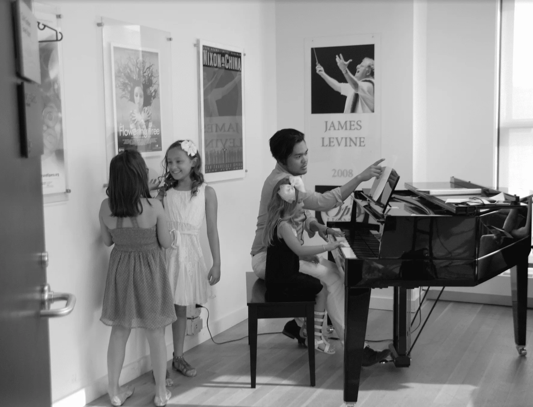 A DEA student learning piano